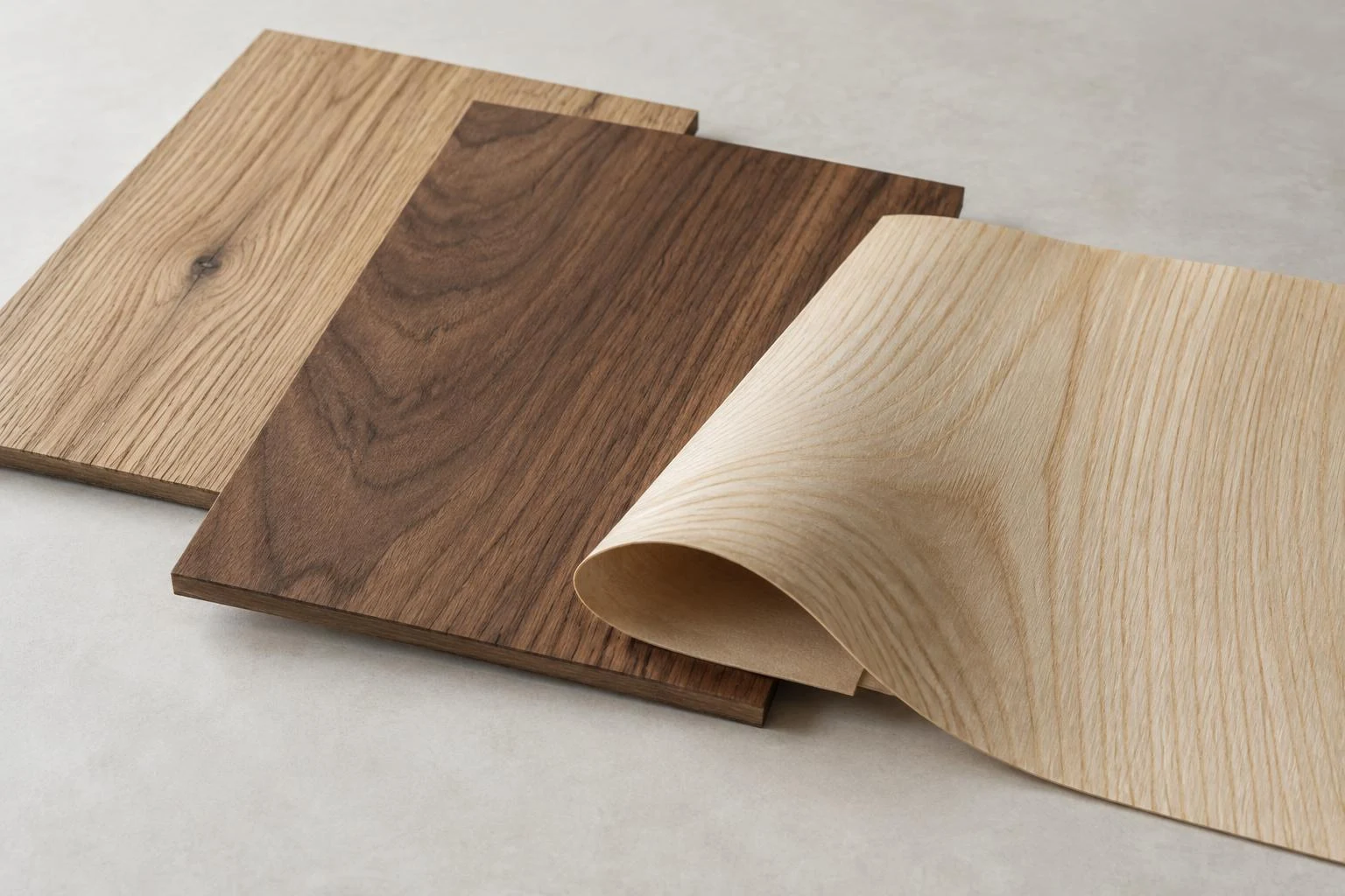 Illustration of natural oak, walnut and ash veneer samples showing wood grain.
